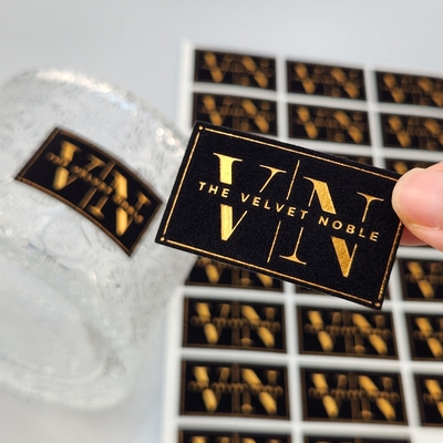 Αγορά High Quality Customized Embossed UV Gold Foil Printing Card Press Gold Art Paper Velvet Gold Stamping Label Sticker for Perfume & Party  online manufacture